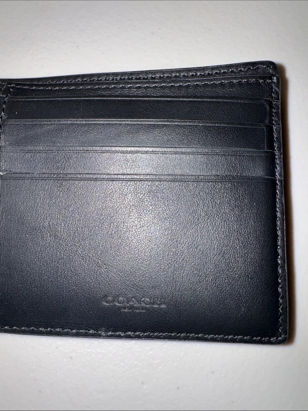 Coach Black Leather Bi-Fold Wallet with Multicolor 'Coach New York' Logo
